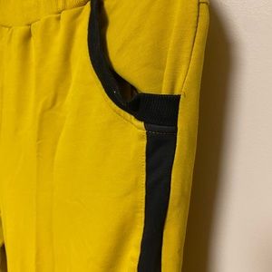 Yellow leisure joggers with black lining